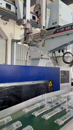Factory production line producing LED traffic batons showing tooling and packaging setup
